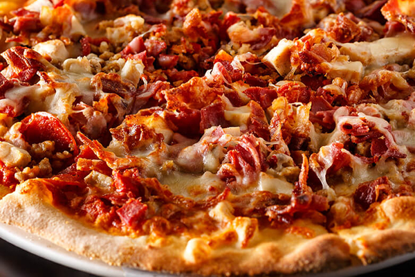 Cheese pizza and specialty pizza at Lincoln MA pizzeria